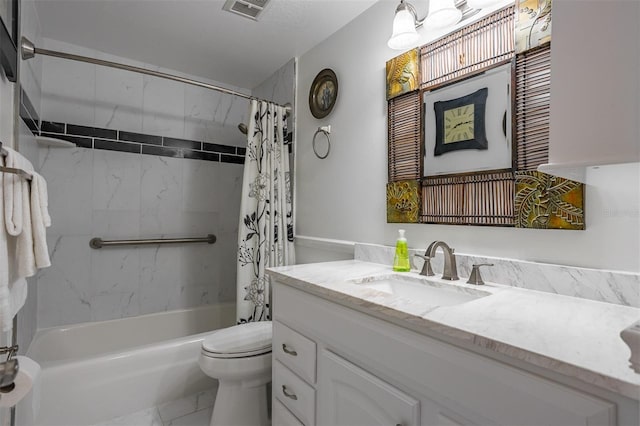 30 Turner St Unit 202, Clearwater, FL 33756 - full bathroom featuring marble look tile flooring, shower / tub combo with curtain, vanity, and toilet