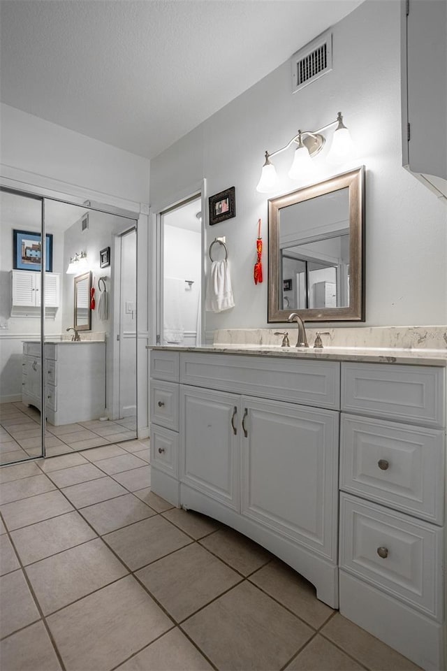 30 Turner St Unit 202, Clearwater, FL 33756 - bathroom with tile patterned flooring and vanity