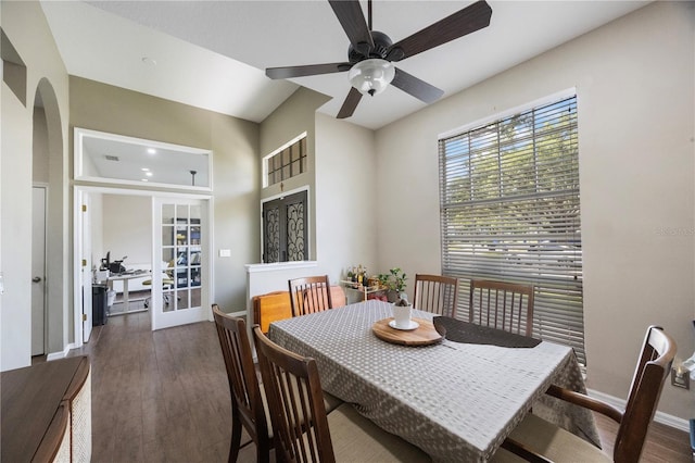 18520 Ambly Ln, Tampa, FL 33647 - dining area with a ceiling fan, wood finished floors, arched walkways, and baseboards