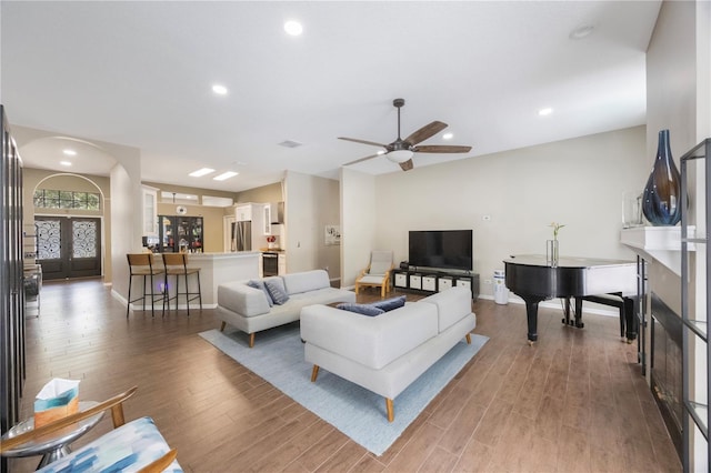 18520 Ambly Ln, Tampa, FL 33647 - living room featuring light wood finished floors, a ceiling fan, baseboards, and recessed lighting
