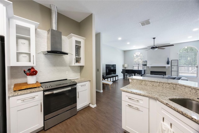 18520 Ambly Ln, Tampa, FL 33647 - kitchen featuring electric stove, a ceiling fan, decorative backsplash, healthy amount of natural light, and recessed lighting