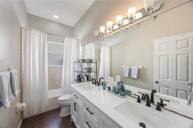 18520 Ambly Ln, Tampa, FL 33647 - bathroom featuring toilet, shower / tub combo, double vanity, and wood finished floors