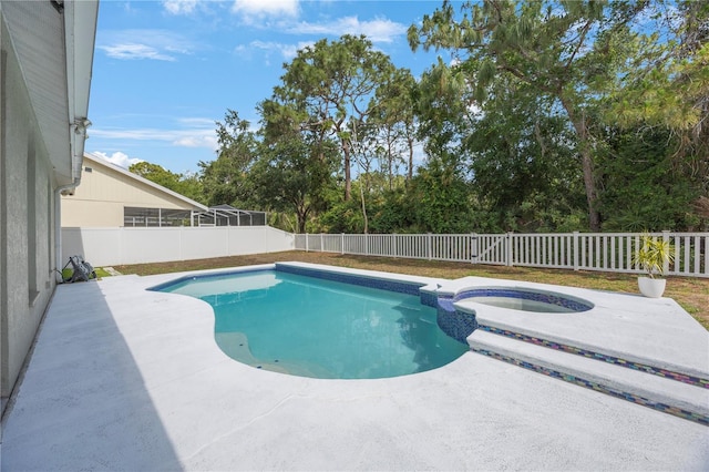 18520 Ambly Ln, Tampa, FL 33647 - view of swimming pool featuring a fenced backyard, a pool with connected hot tub, a patio, and view of scattered trees