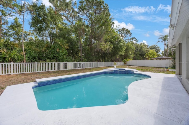 18520 Ambly Ln, Tampa, FL 33647 - view of pool with a fenced backyard, a patio, a pool with connected hot tub, and view of wooded area
