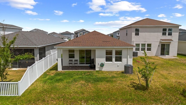 11819 Brighton Knoll Loop, Riverview, FL 33579 - rear view of property with a sunroom, stucco siding, roof with shingles, and central AC