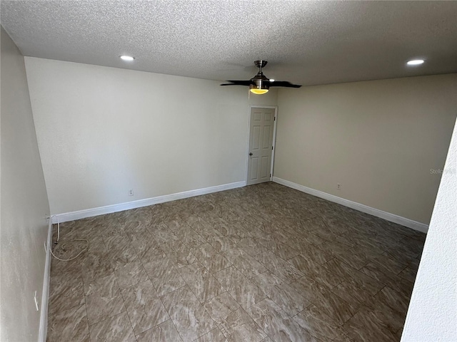 unfurnished room with recessed lighting, a ceiling fan, a textured ceiling, and baseboards
