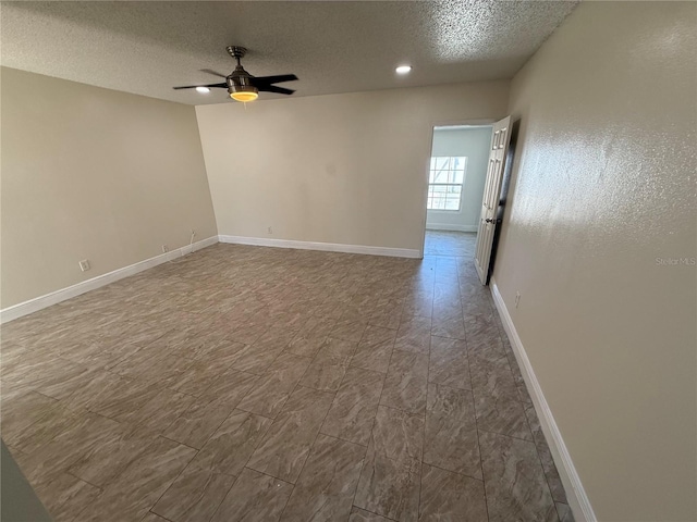 unfurnished room with baseboards, recessed lighting, a textured ceiling, and ceiling fan