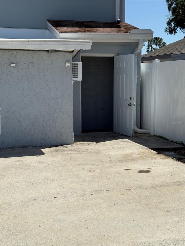 property entrance with fence