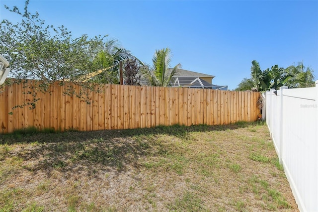 view of yard featuring a fenced backyard