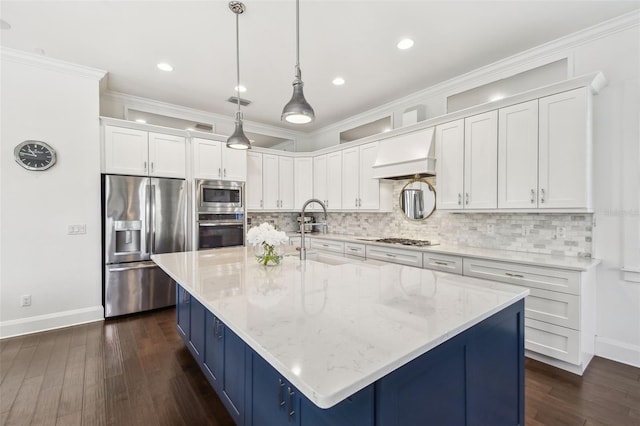 kitchen featuring baseboards, a sink, appliances with stainless steel finishes, and white cabinets