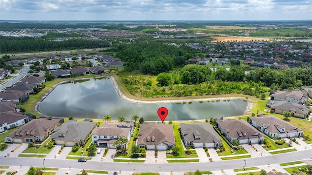 aerial view featuring a residential view and a water view