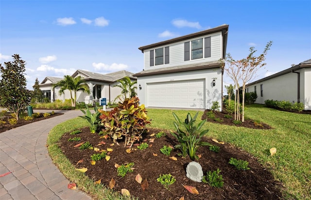 traditional-style house with an attached garage and a front lawn