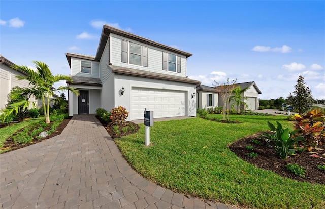 traditional-style home featuring stucco siding, a front lawn, and a garage