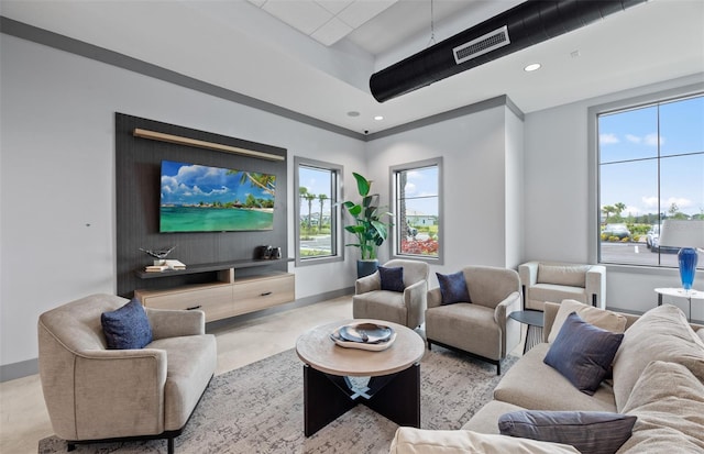 living room featuring recessed lighting, baseboards, visible vents, and plenty of natural light