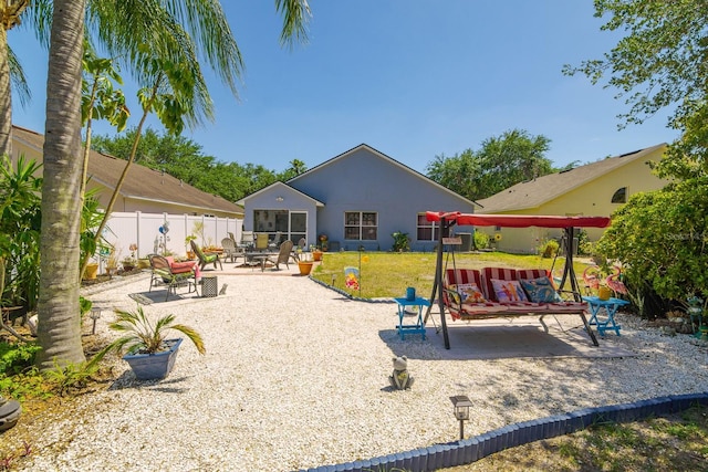 view of play area featuring a patio area and fence