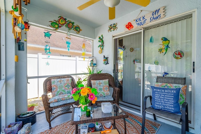 sunroom / solarium with ceiling fan