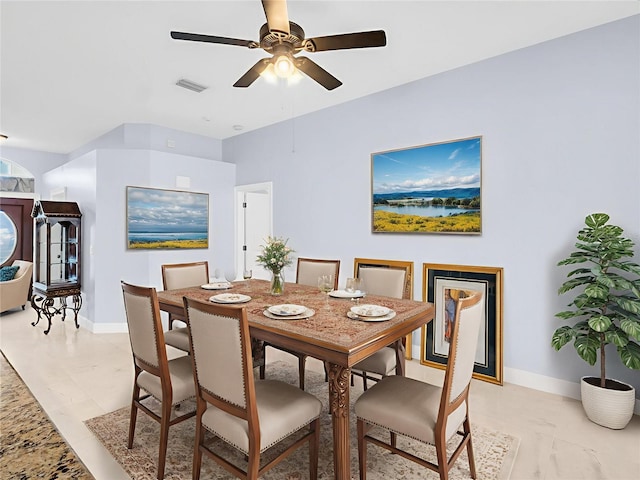 1424 Ridge Shore Dr, Tarpon Springs, FL 34689 - dining room with ceiling fan and light marble finish floors