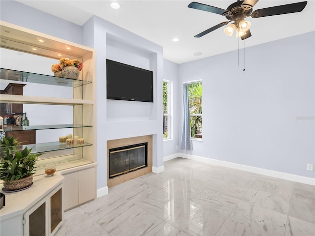 1424 Ridge Shore Dr, Tarpon Springs, FL 34689 - unfurnished living room with a fireplace, light marble finish floors, ceiling fan, and recessed lighting