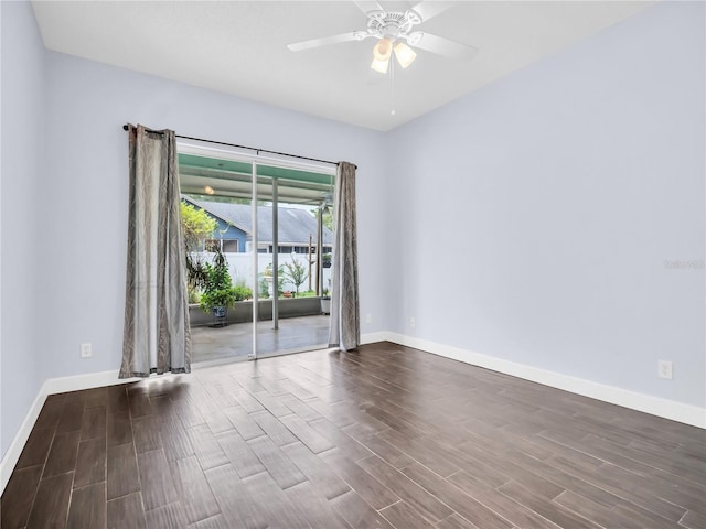 1424 Ridge Shore Dr, Tarpon Springs, FL 34689 - unfurnished room featuring dark wood-style floors and ceiling fan