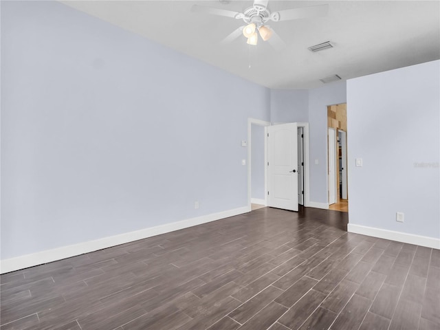 1424 Ridge Shore Dr, Tarpon Springs, FL 34689 - empty room with dark wood finished floors and ceiling fan