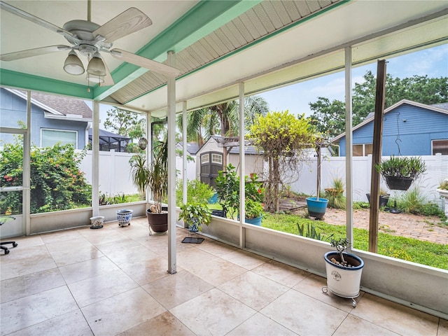1424 Ridge Shore Dr, Tarpon Springs, FL 34689 - unfurnished sunroom with ceiling fan