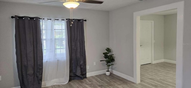 917 Adamson Ct, Lake Alfred, FL 33850 - empty room with wood finished floors and a ceiling fan