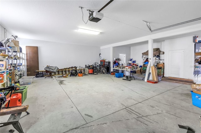garage featuring a garage door opener