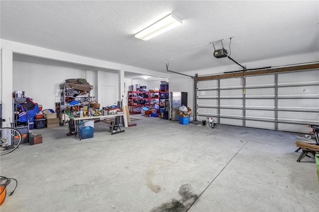garage featuring a garage door opener