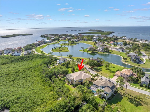 bird's eye view with a water view and a residential view