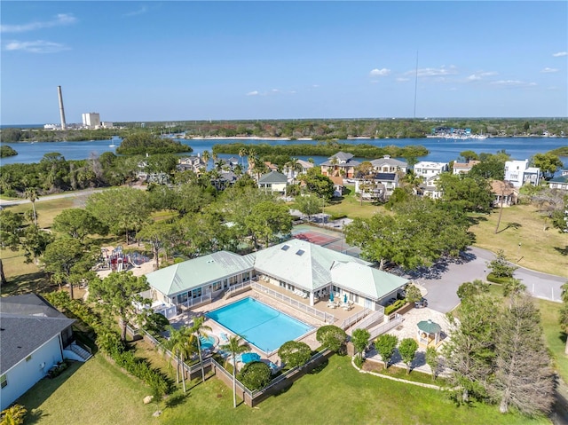 birds eye view of property with a water view
