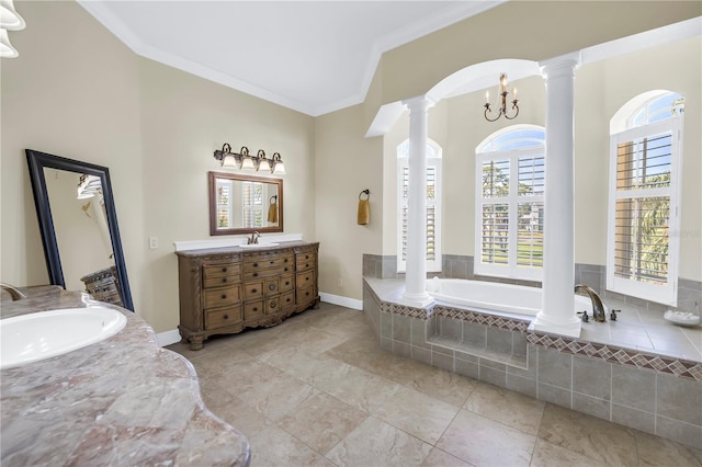full bath featuring a bath, vanity, tile patterned floors, ornamental molding, and ornate columns