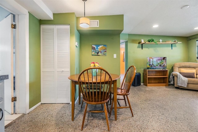 dining room with recessed lighting, baseboards, visible vents, and speckled floor