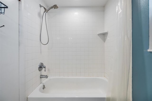 bathroom with shower / bath combo