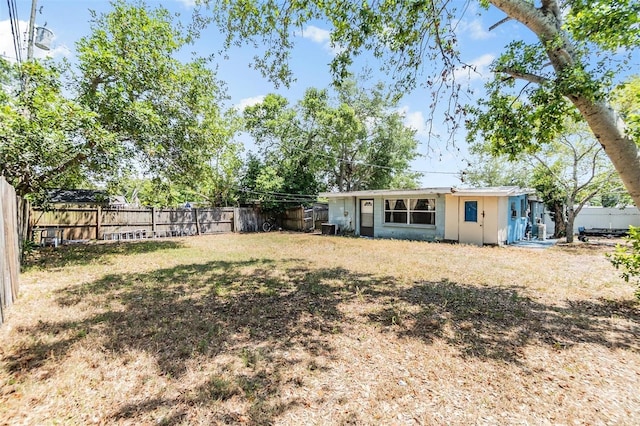 view of yard with a fenced backyard