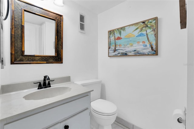 1 Key Capri Unit 303E, Treasure Island, FL 33706 - bathroom featuring vanity and toilet
