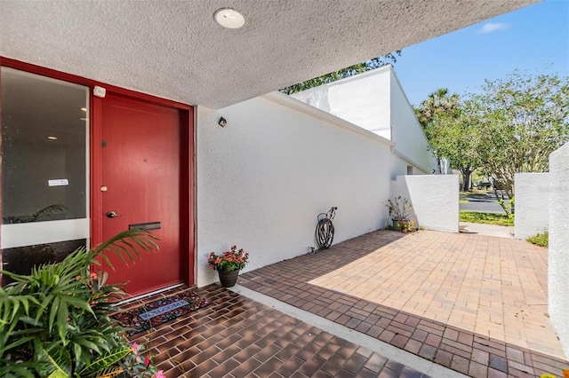4002 Cypress Ct Unit 4002, Tampa, FL 33618 - entrance to property featuring a patio and stucco siding