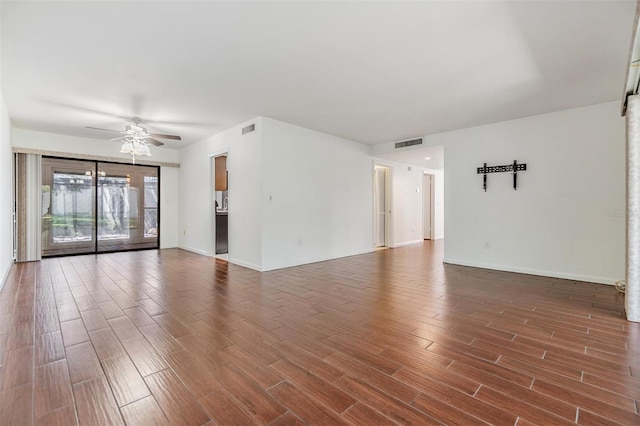 4002 Cypress Ct Unit 4002, Tampa, FL 33618 - unfurnished living room with a ceiling fan, baseboards, visible vents, and wood finished floors