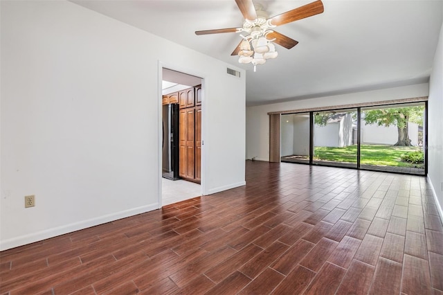 4002 Cypress Ct Unit 4002, Tampa, FL 33618 - unfurnished room featuring baseboards, wood finished floors, and visible vents