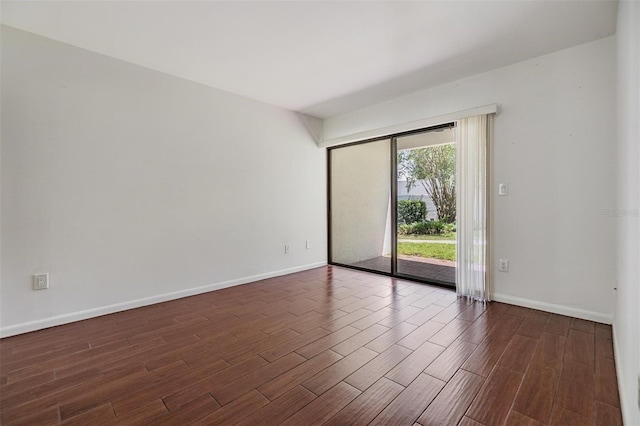 4002 Cypress Ct Unit 4002, Tampa, FL 33618 - unfurnished room with baseboards and dark wood finished floors