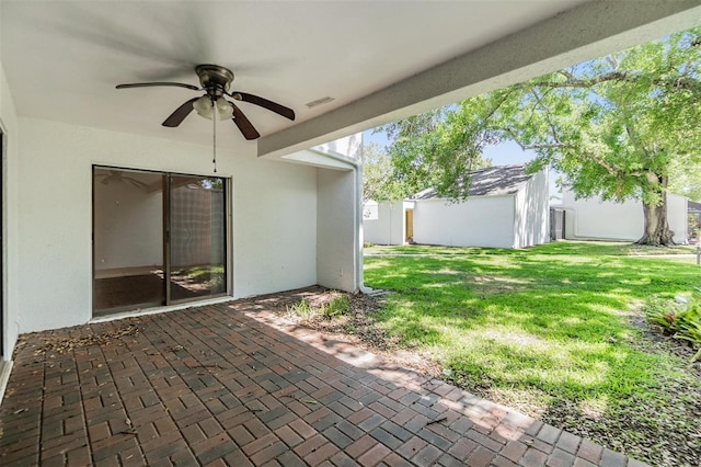 4002 Cypress Ct Unit 4002, Tampa, FL 33618 - view of patio / terrace featuring a storage shed, ceiling fan, an outbuilding, and visible vents