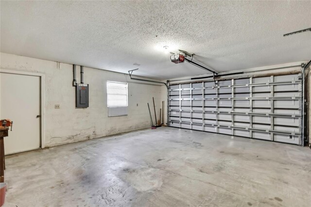 883 N Hollywood Cir, Crystal River, FL 34429 - garage featuring a garage door opener and electric panel