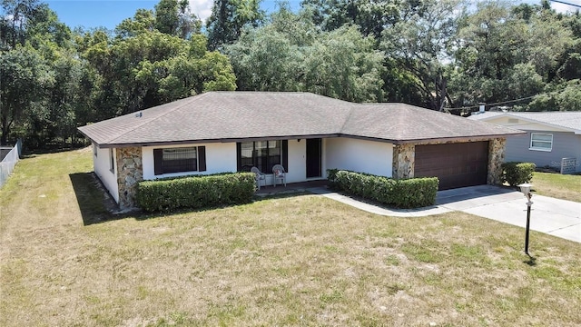883 N Hollywood Cir, Crystal River, FL 34429 - ranch-style home featuring an attached garage, a front lawn, and stone siding