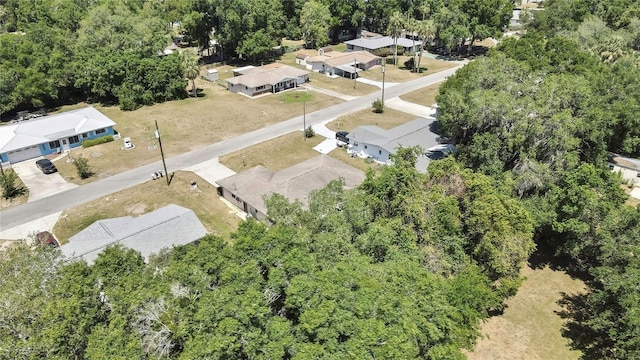 883 N Hollywood Cir, Crystal River, FL 34429 - birds eye view of property with a residential view and a forest view