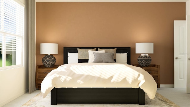 bedroom featuring baseboards