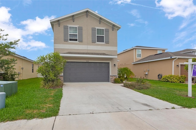 traditional home featuring an attached garage, a front lawn, stone siding, stucco siding, and concrete driveway