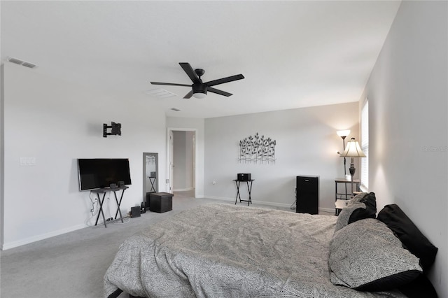 bedroom featuring carpet floors, baseboards, a ceiling fan, and visible vents