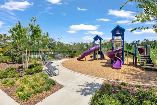 community jungle gym with fence