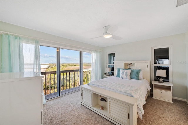 bedroom featuring access to outside, light colored carpet, ceiling fan, and visible vents