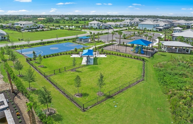 birds eye view of property with a residential view