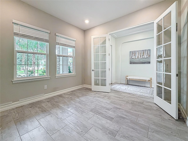 18203 Pine Hammock Blvd, Lutz, FL 33548 - doorway to outside with french doors and baseboards